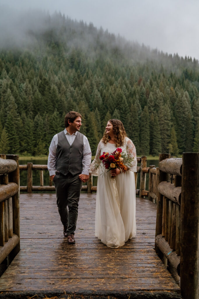 Couple leaving the Trillium Lake dock in Oregon after saying their vows.