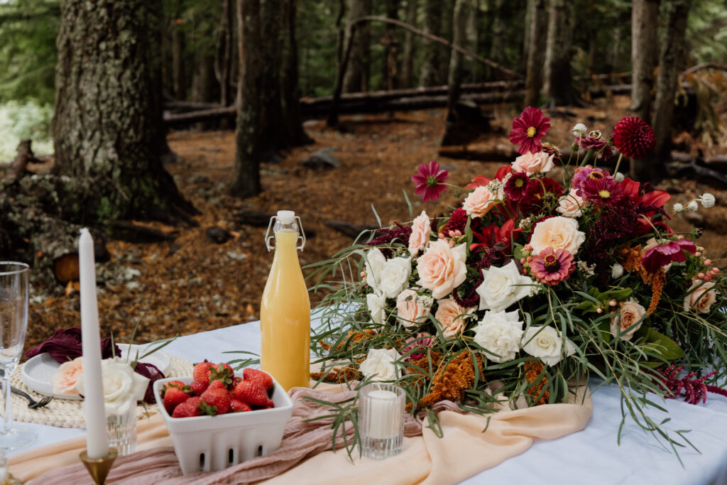 Tablescape photo with pastries, berries, and florals during a couples brunch at their Trillium Lake Elopement in Oregon.