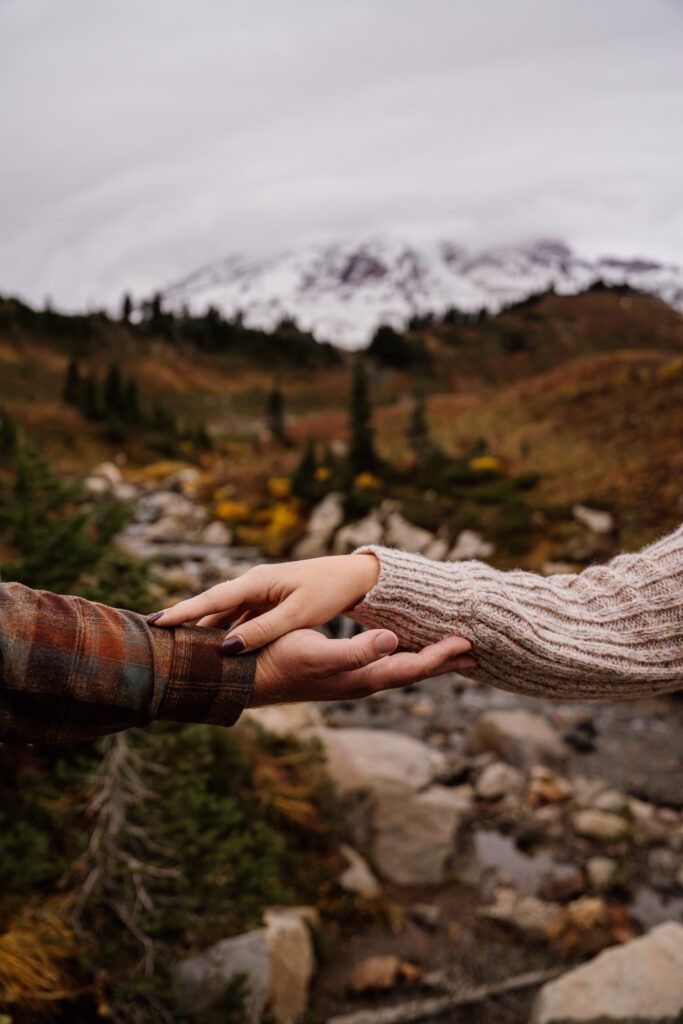 Romantic hand photo at Mount Rainier National Park.