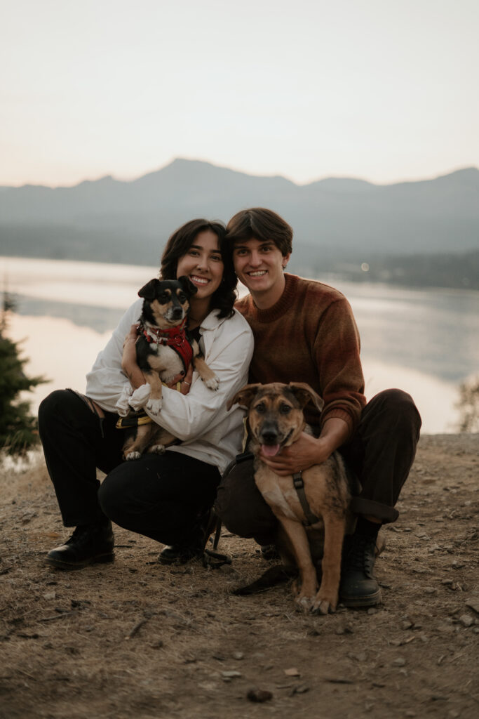 Couple with their two dogs posed for the camera during their Columbia River Gorge Engagement Photos.