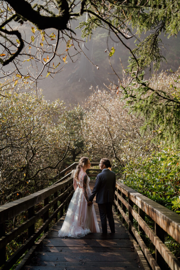 Couple on the path down to Indian Beach at Ecola State Park during their elopement.