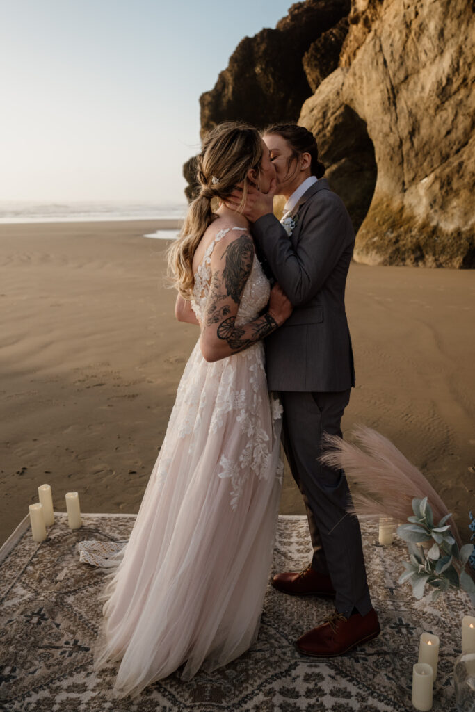 Brides kissing during their Arcadia Beach Elopement on the Oregon Coast.