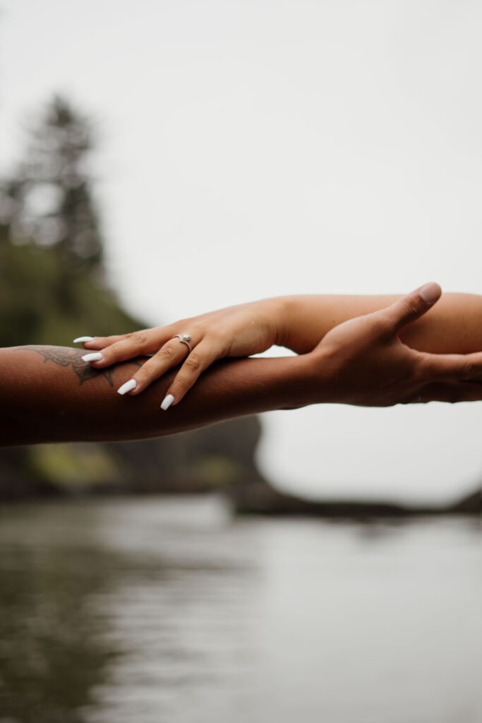 Close up of the couples hands.