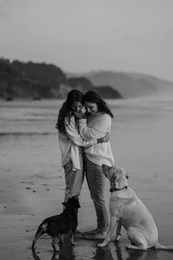 couples photos with dogs on Arcadia Beach