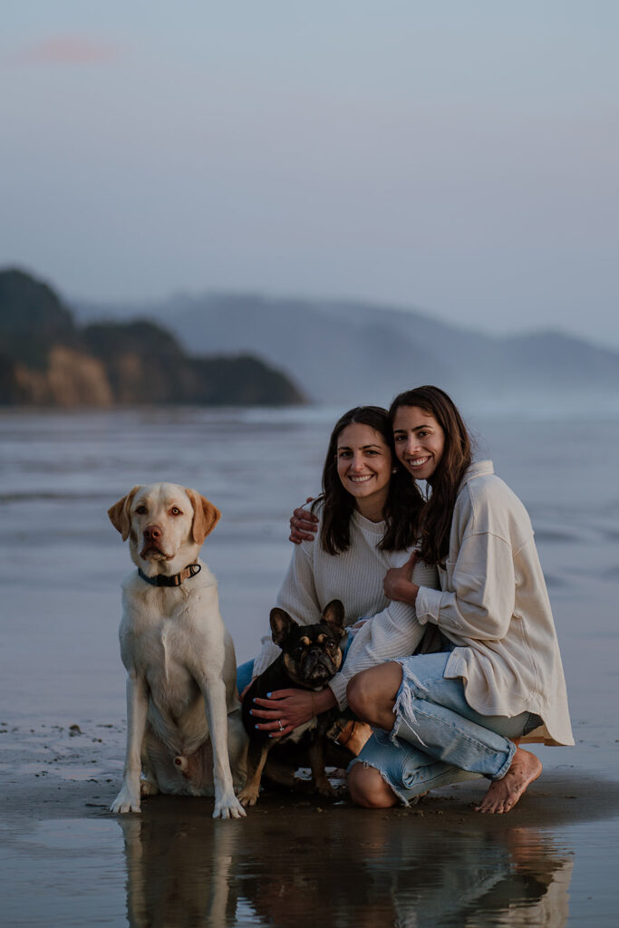 couples photos with dogs on Arcadia Beach