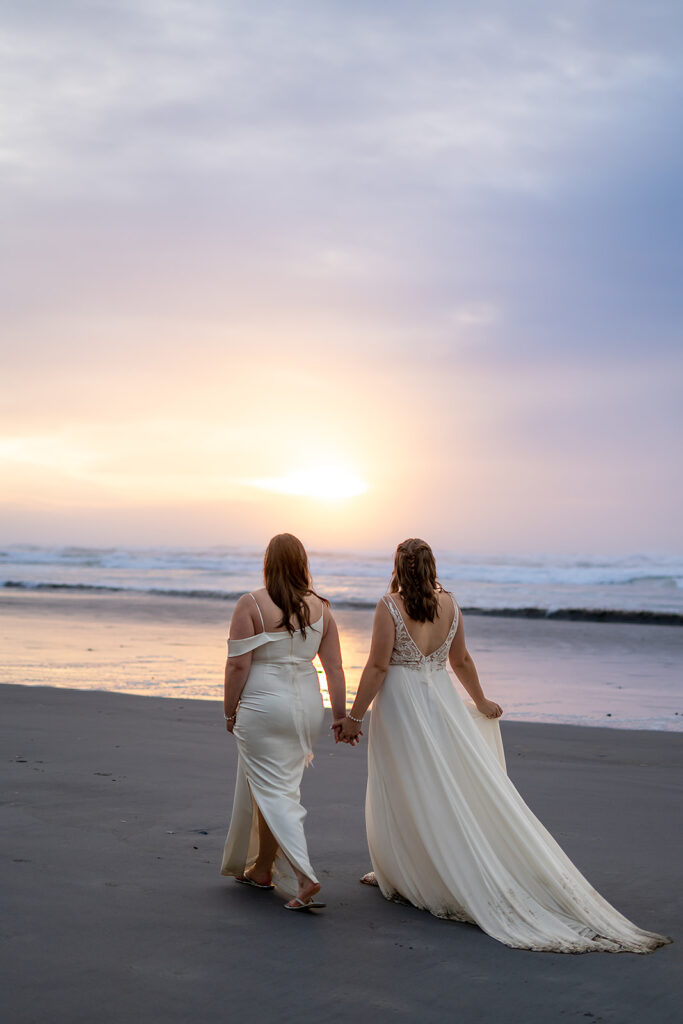 Sunset brings out purple hues for some couples portraits on Arcadia Beach