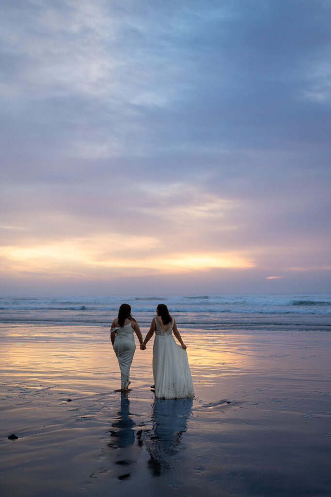 Sunset brings out purple hues for some couples portraits on Arcadia Beach