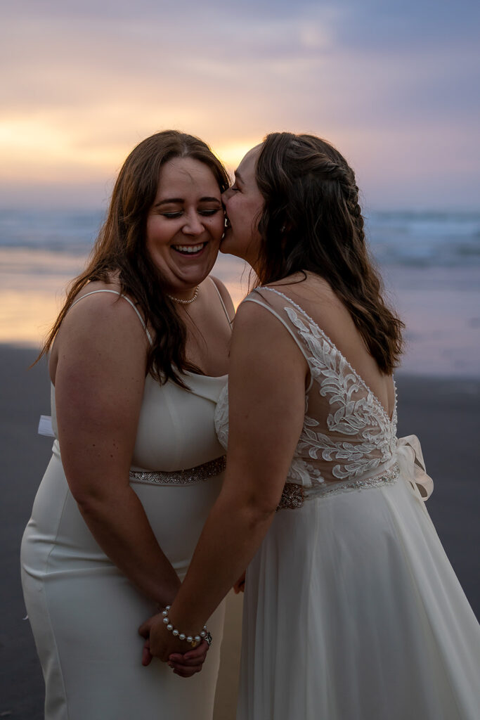 Sunset brings out purple hues for some couples portraits on Arcadia Beach