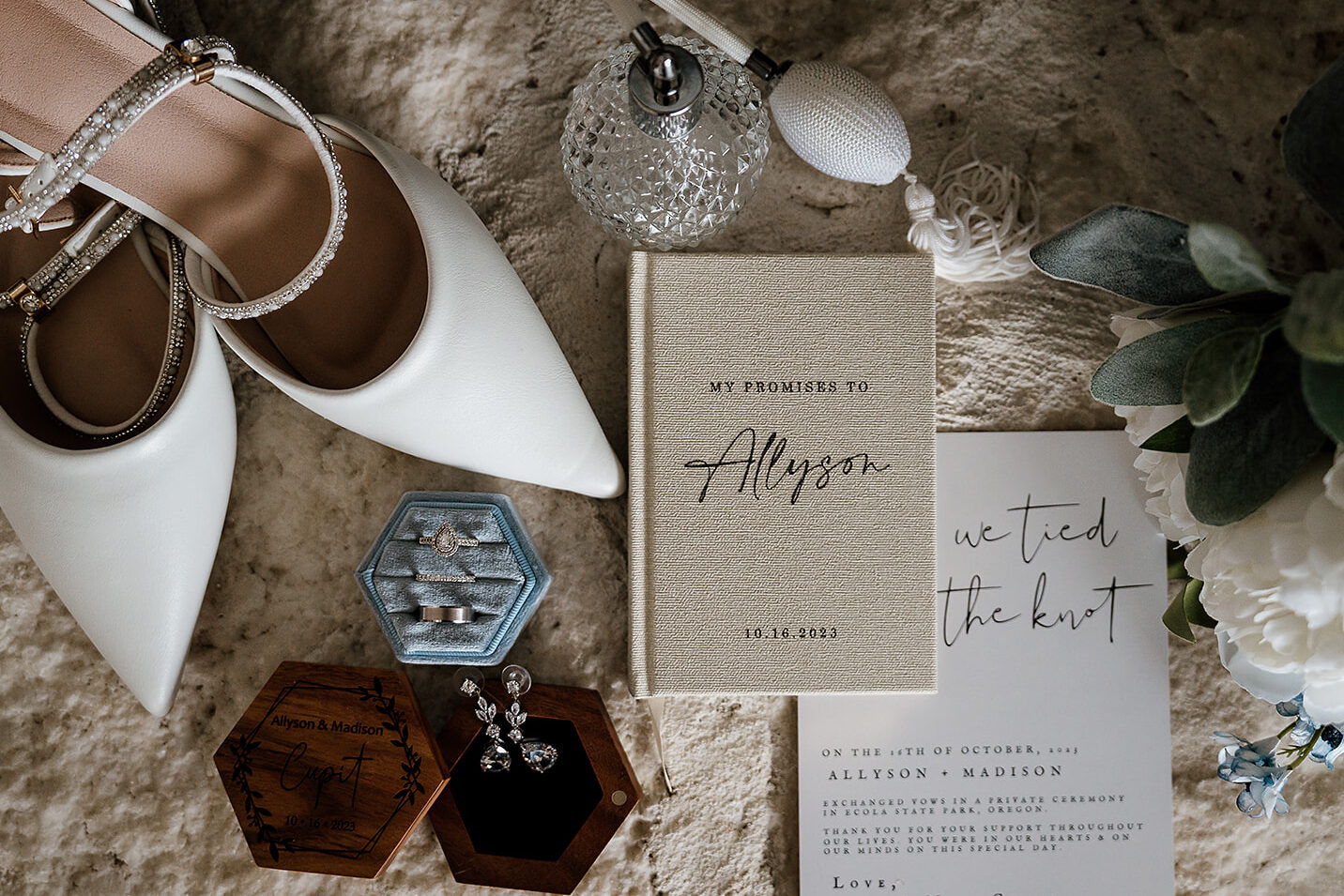 Coastal elopement details flat lay