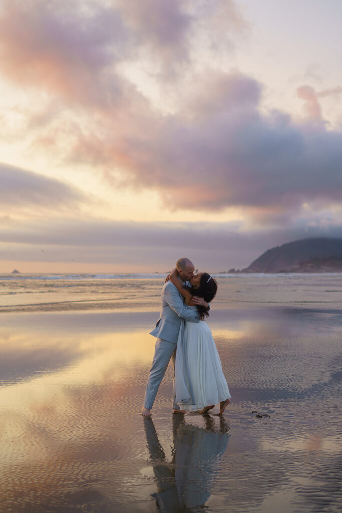 Cotton candy skies surround bride and groom during their post-nuptial shoot