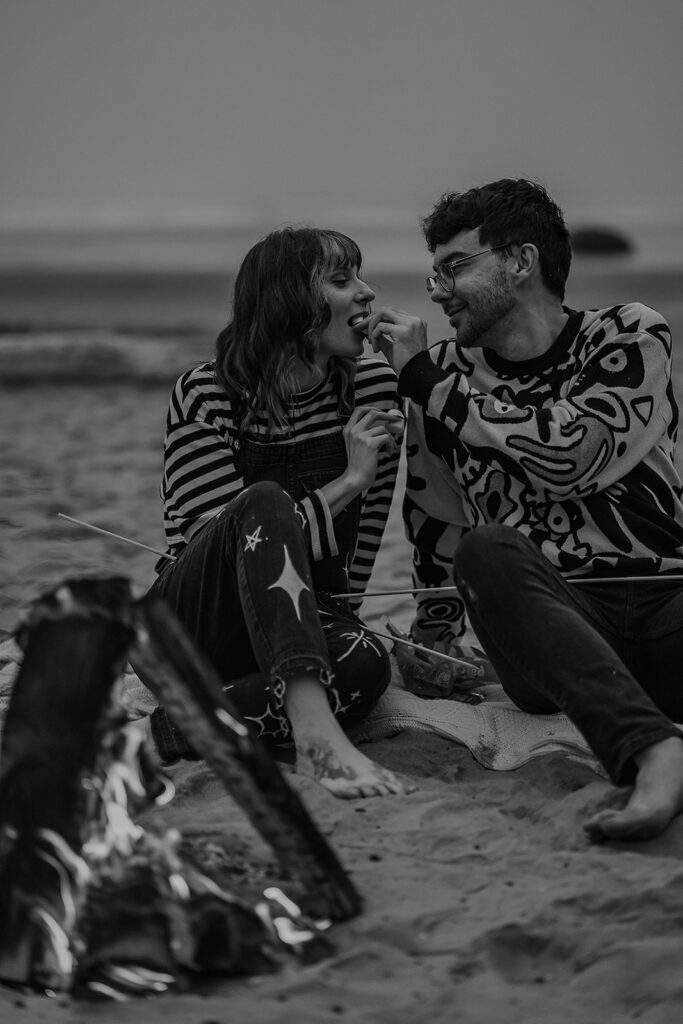 Oregon engagement photos by a bonfire at Hug Point