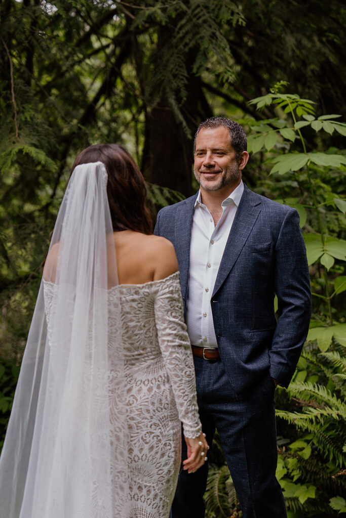 First look surrounded by green foliage and mossy forests