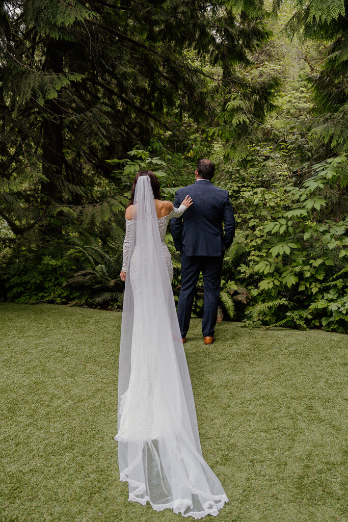 First look surrounded by green foliage and mossy forests