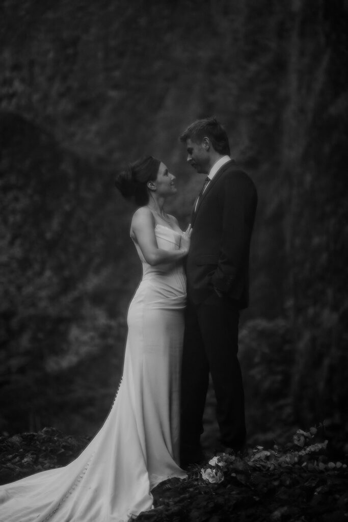 Waterfall bride and groom portraits at Wahclella Falls in the Columbia River Gorge