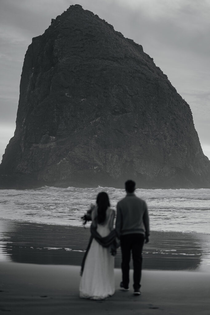 Cannon Beach bridal portraits with Haystack Rock in the backdrop