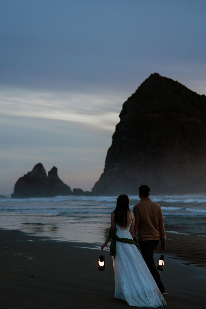 Night Time lantern couple portraits on Cannon Beach after an Ecola State Park elopement day