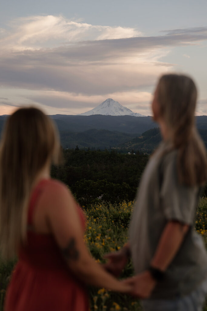 Sunset couple pictures at sunset with Mount Hood in the background