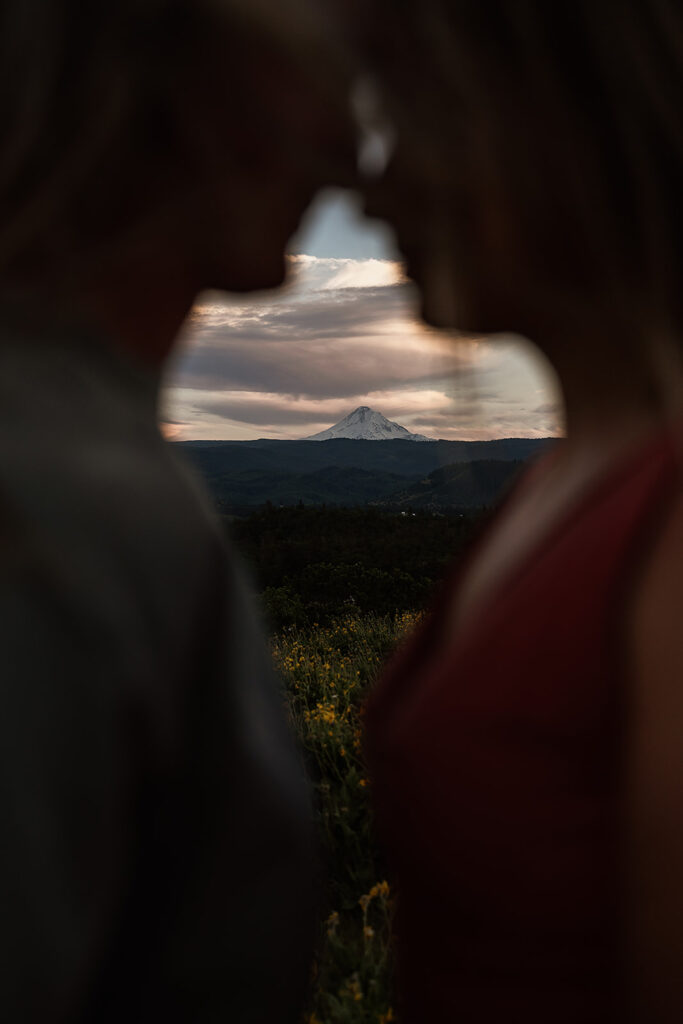 Sunset couple pictures at sunset with Mount Hood in the background