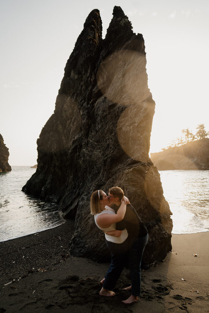 Golden hour couple photos on the Oregon Coast after a surprise beach proposal