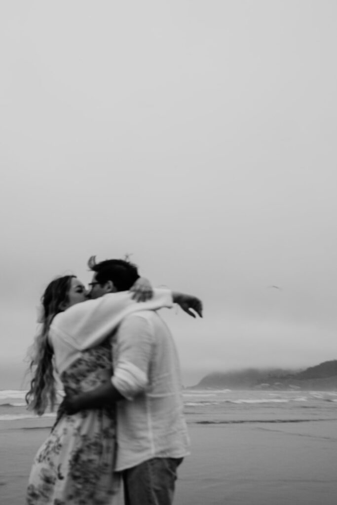 Cinematic engagement photos on the beach
