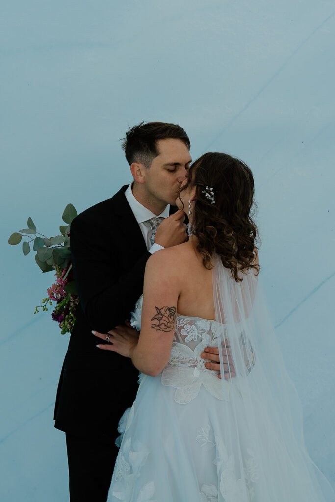 Alaska glacier elopement portraits in the ice walls