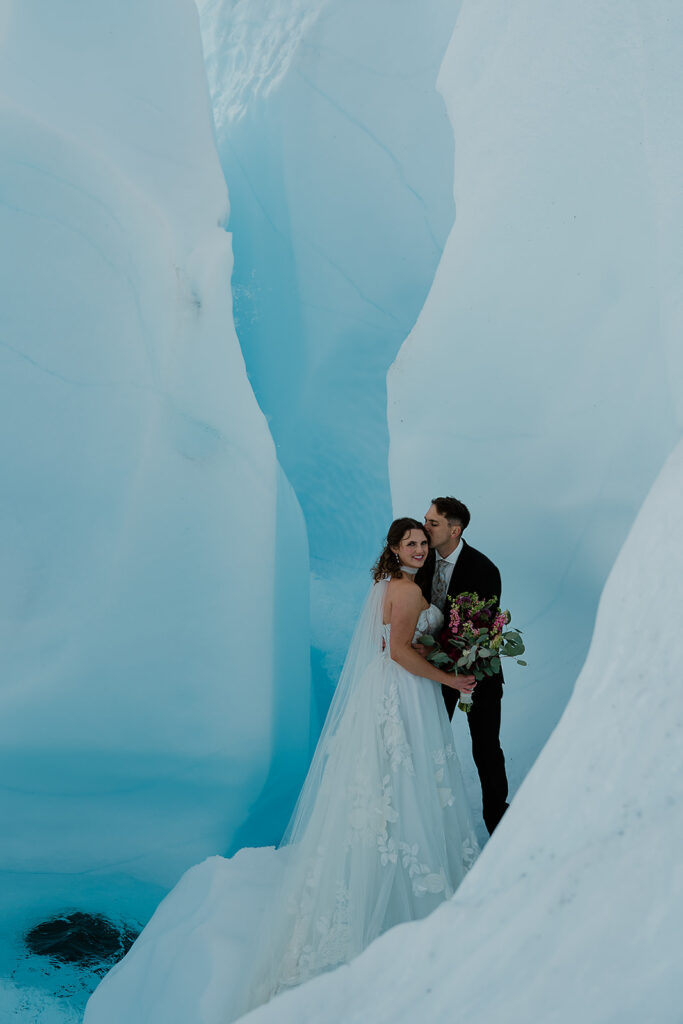 Alaska glacier elopement portraits in the ice walls