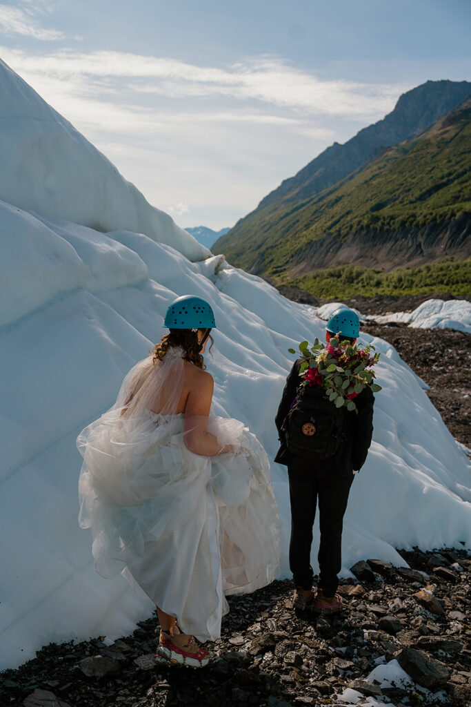 Bride and groom hike to Matanuska Glacier in Alaska for their elopement ceremony