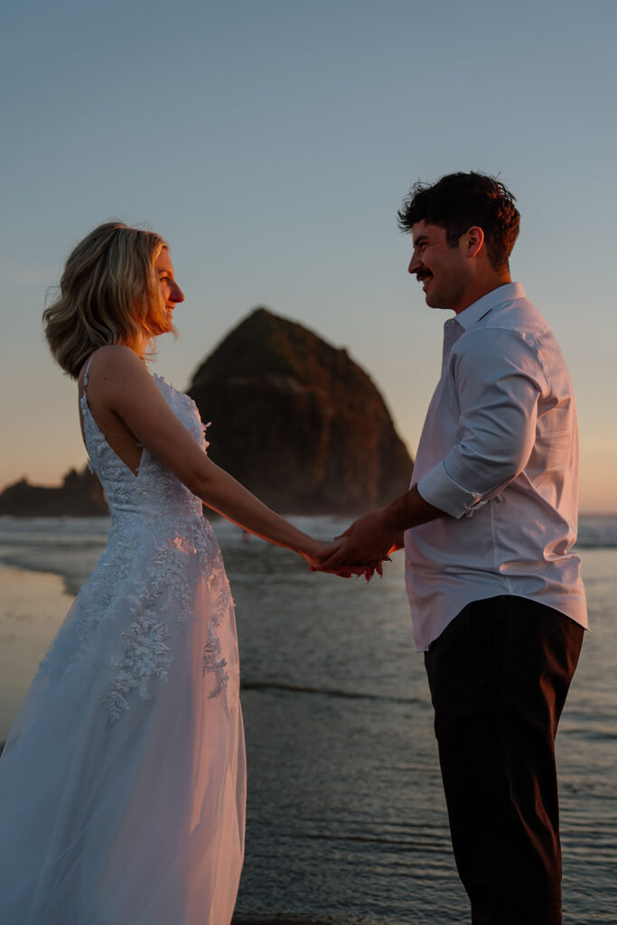 Cannon Beach wedding photos in front of Haystack Rock