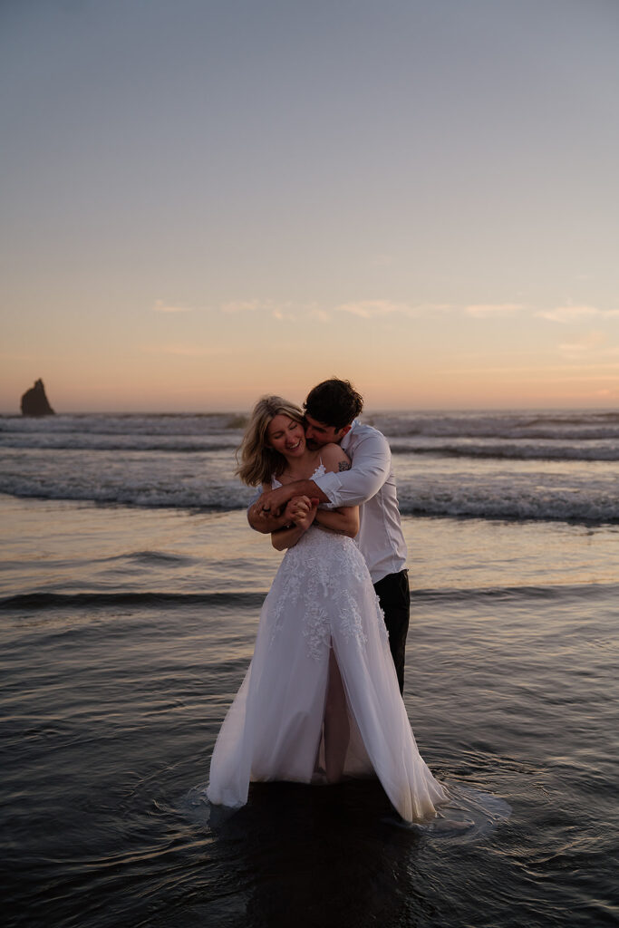 Cannon Beach wedding photos in the ocean at sunset