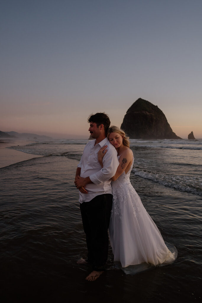 Cannon Beach wedding photos in front of Haystack Rock