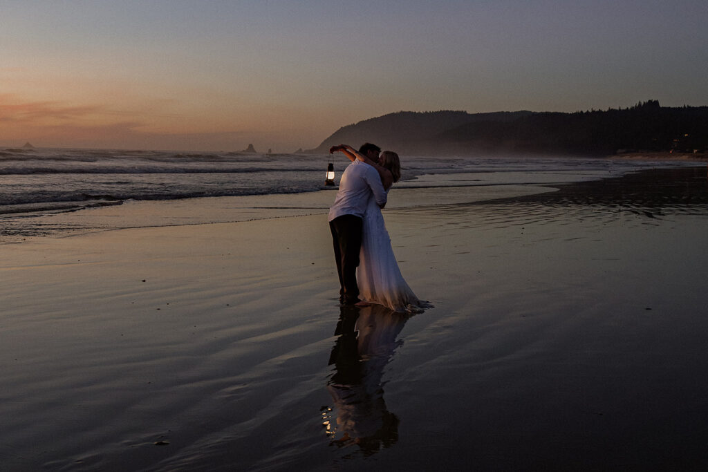Cannon Beach wedding photos at dusk with lanters