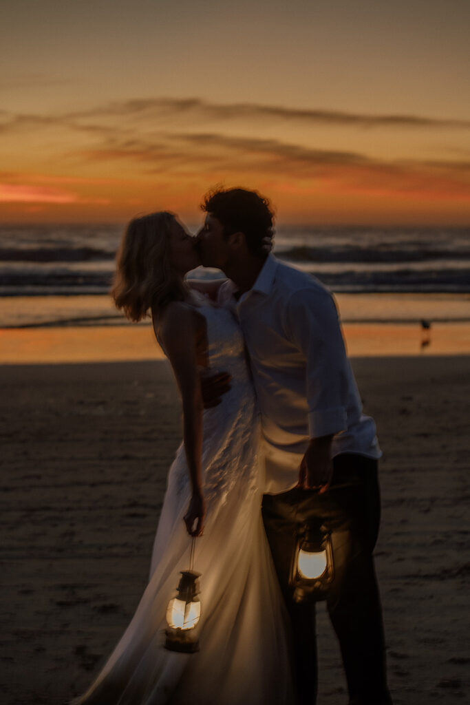 Cannon Beach wedding photos at dusk with lanters