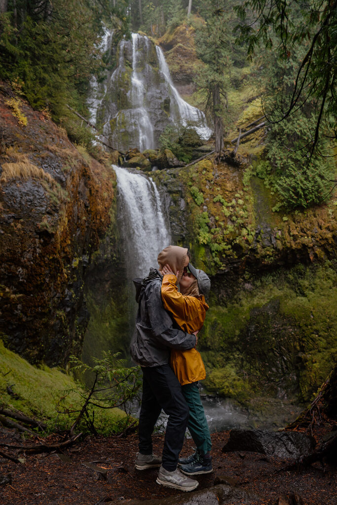 Waterfall couples photos after a surprise proposal