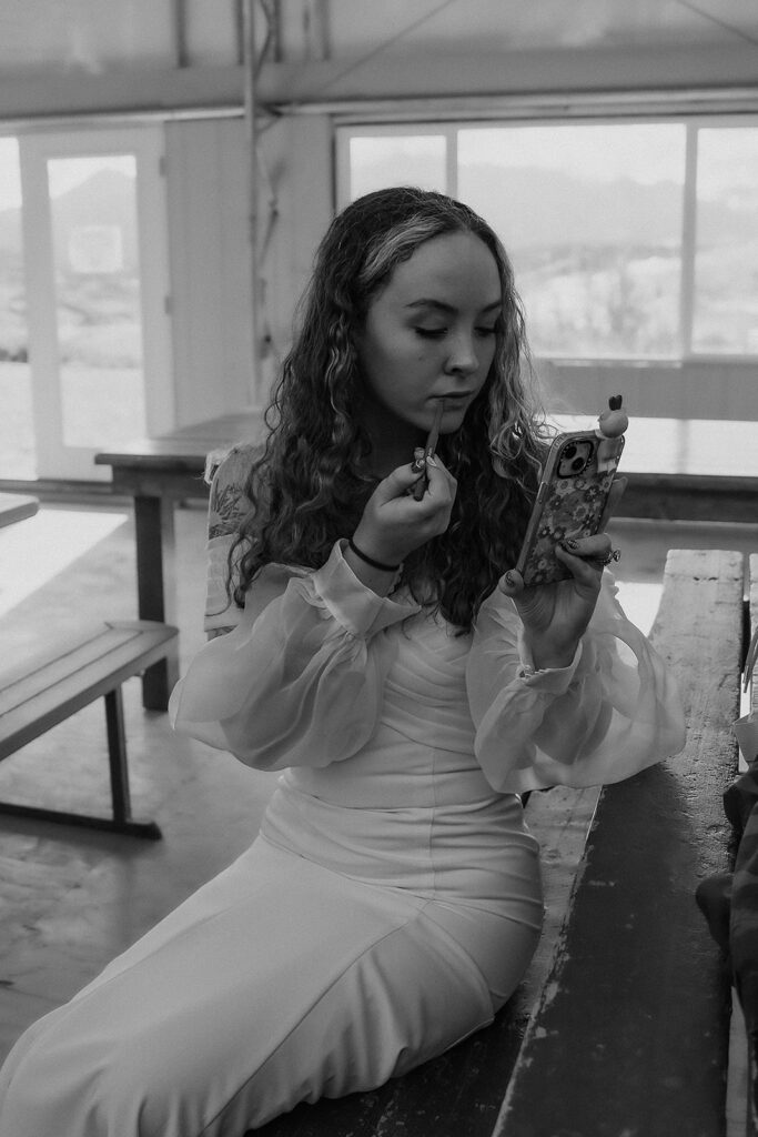 Bride getting ready for her Alaska glacier elopement