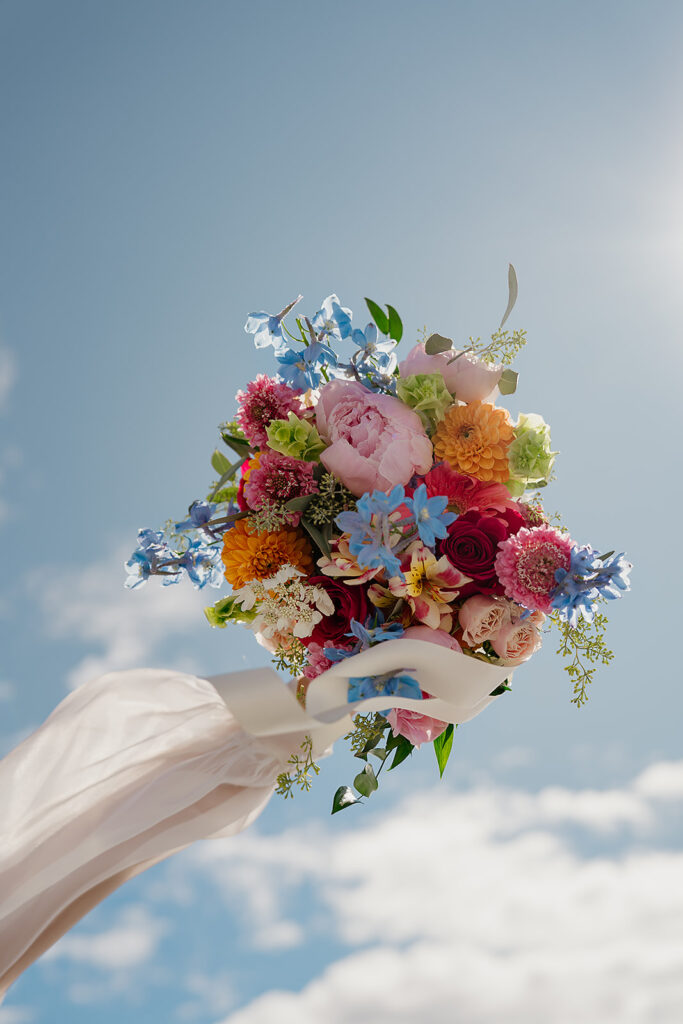 Bright and bold colorful elopement floral bouquet
