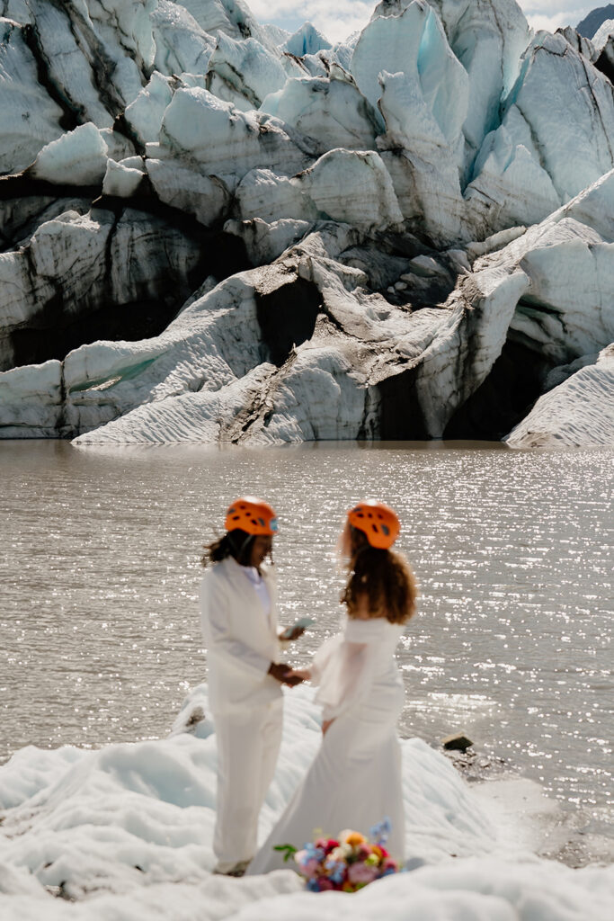 Alaska glacier elopement ceremony on a sunny summer day