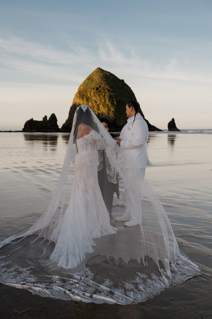 Intimate Cannon Beach wedding ceremony at sunrise