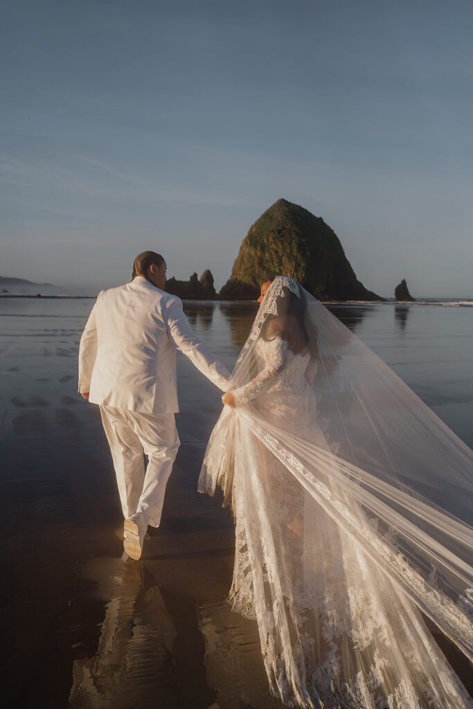 Cinematic sunrise Cannon Beach elopement portraits