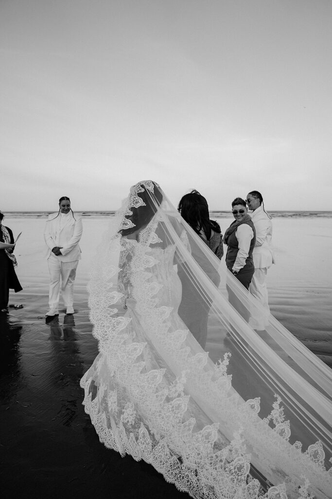Intimate Cannon Beach wedding ceremony at sunrise