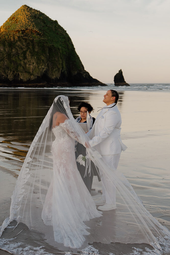 Intimate Cannon Beach wedding ceremony at sunrise
