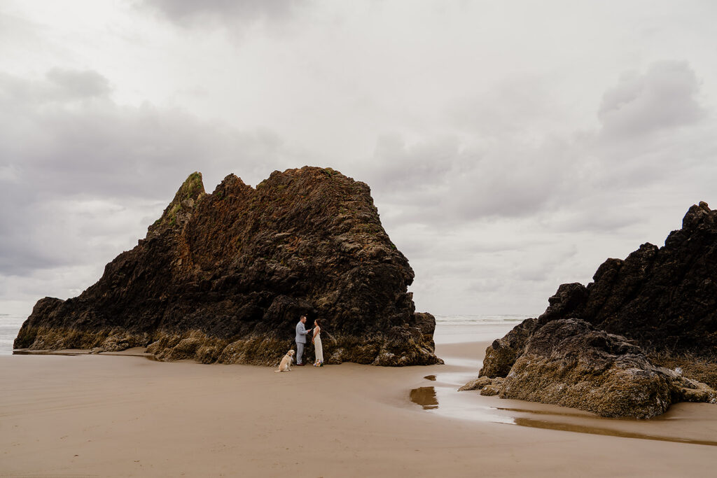 Arcadia Beach wedding ceremony with moody skies