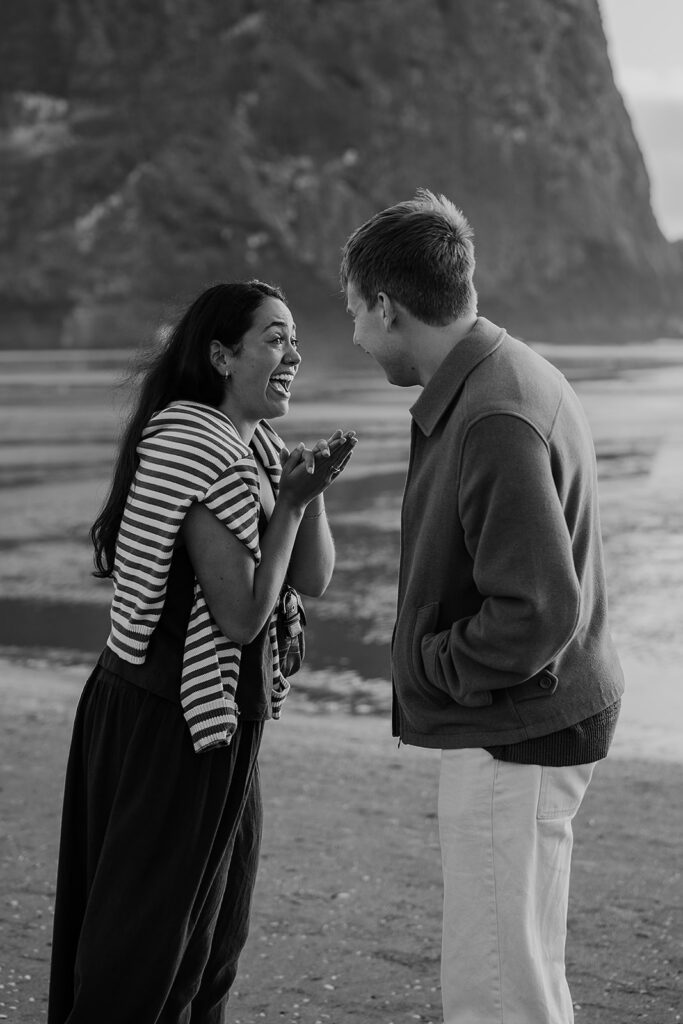 Surprise marriage proposal on Cannon Beach in front of Haystack Rock